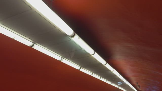 Lamps along a tunnel.