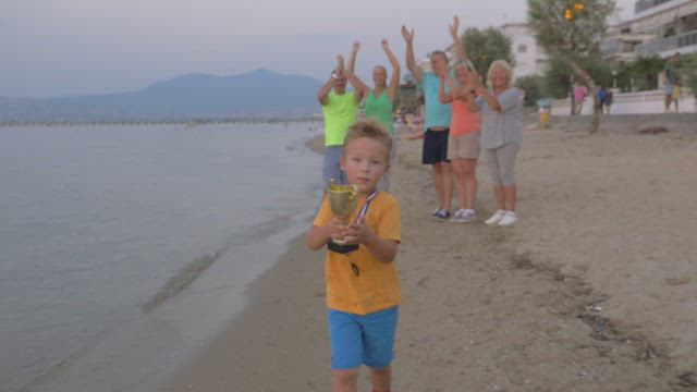 Boy with a medal.