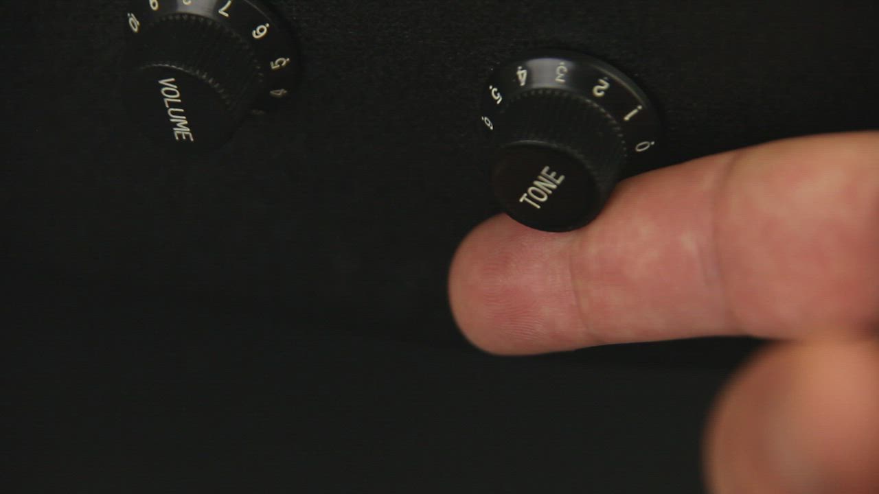 Moving an audio dial - Free Stock Video