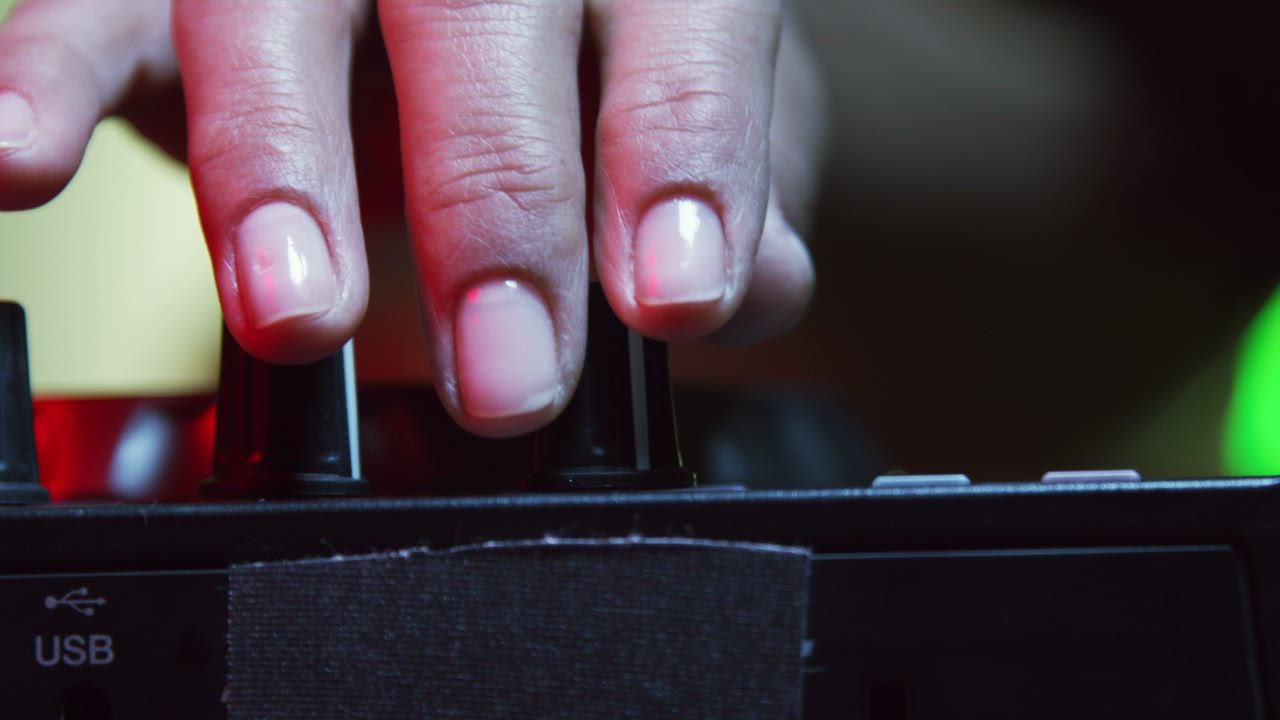 DJ adjusting volume - Free Stock Video