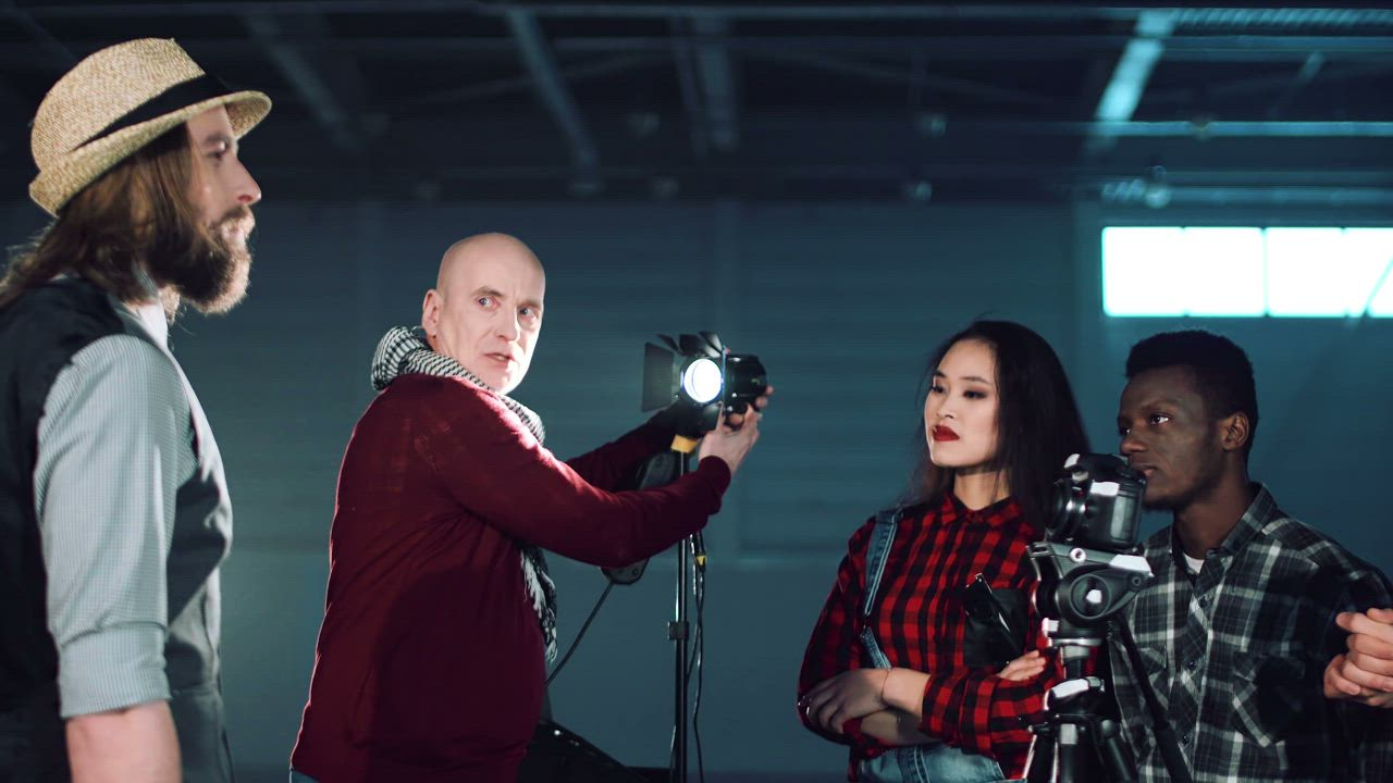 Teaching photography lighting to students - Free Stock Video