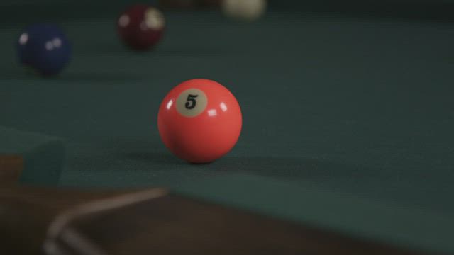 Hitting ball 5 into a hole.