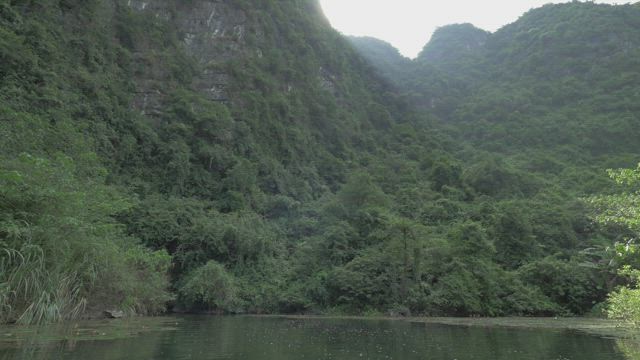 Approaching a mountain by river.