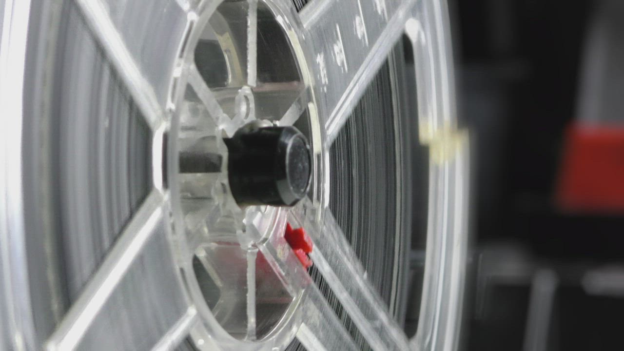 Old film spinning while playing - Free Stock Video