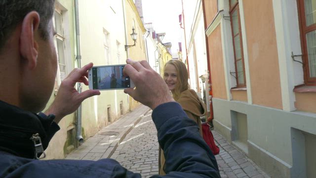 Taking photos during a city trip.