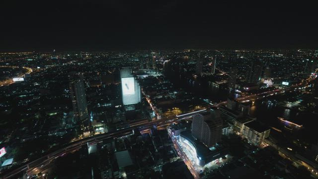 Illuminated city through the night.