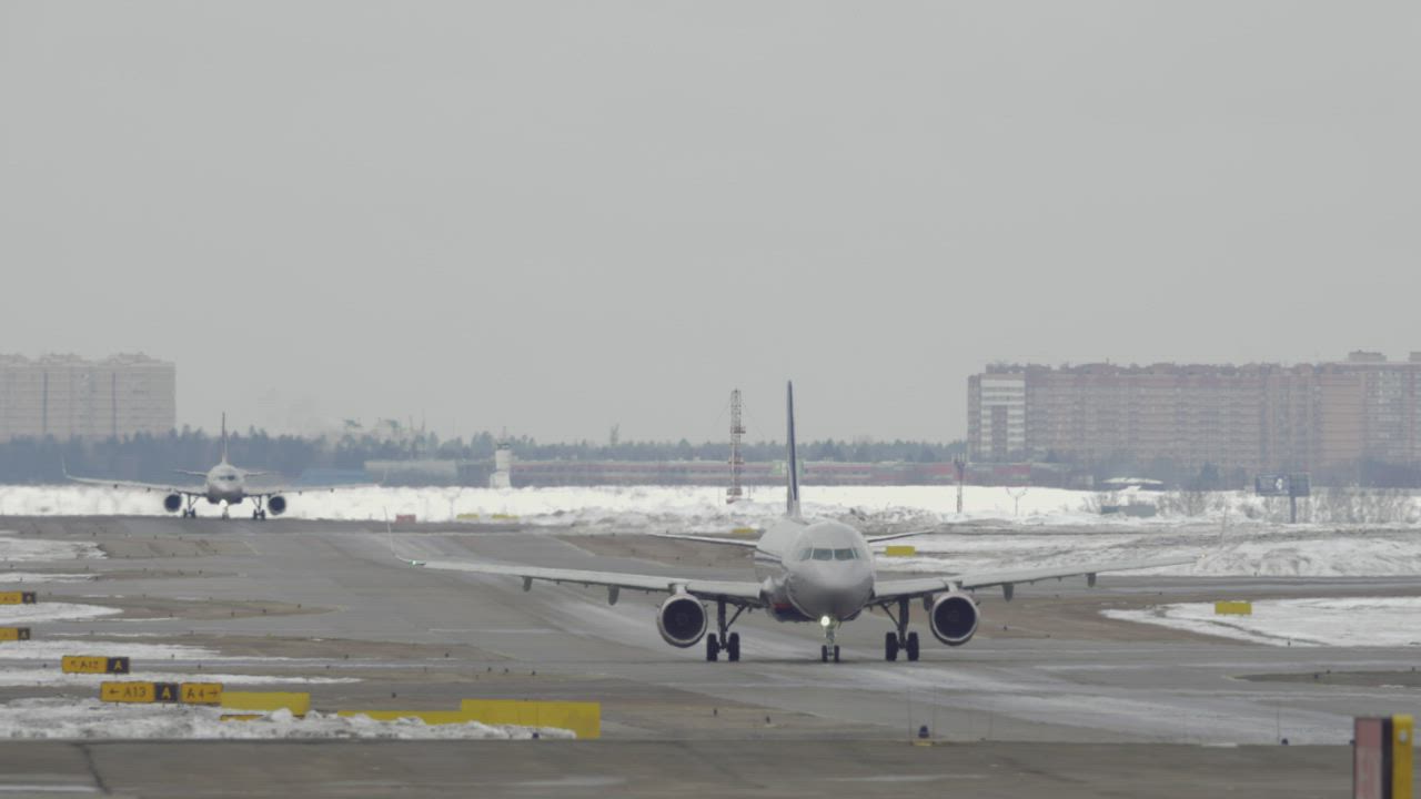 Snow cleared from a runway - Free Stock Video