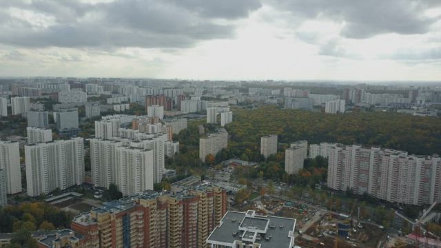 Large residential area under clouds.