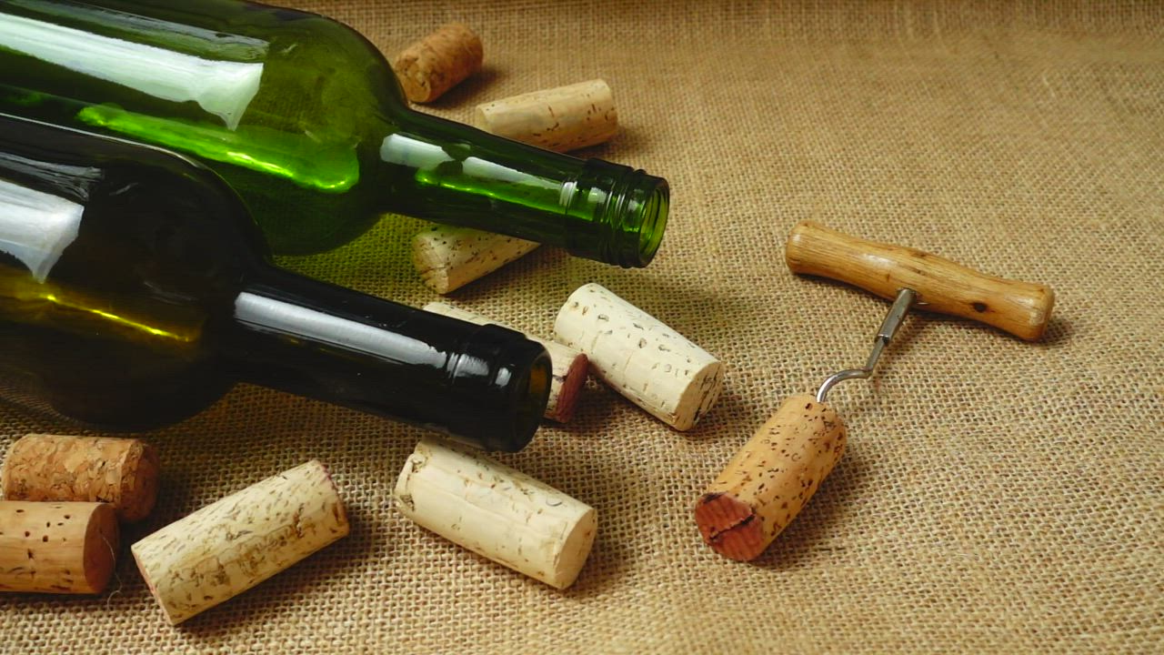 Corks falling onto a table - Free Stock Video