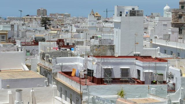 Square rooftops across a city.