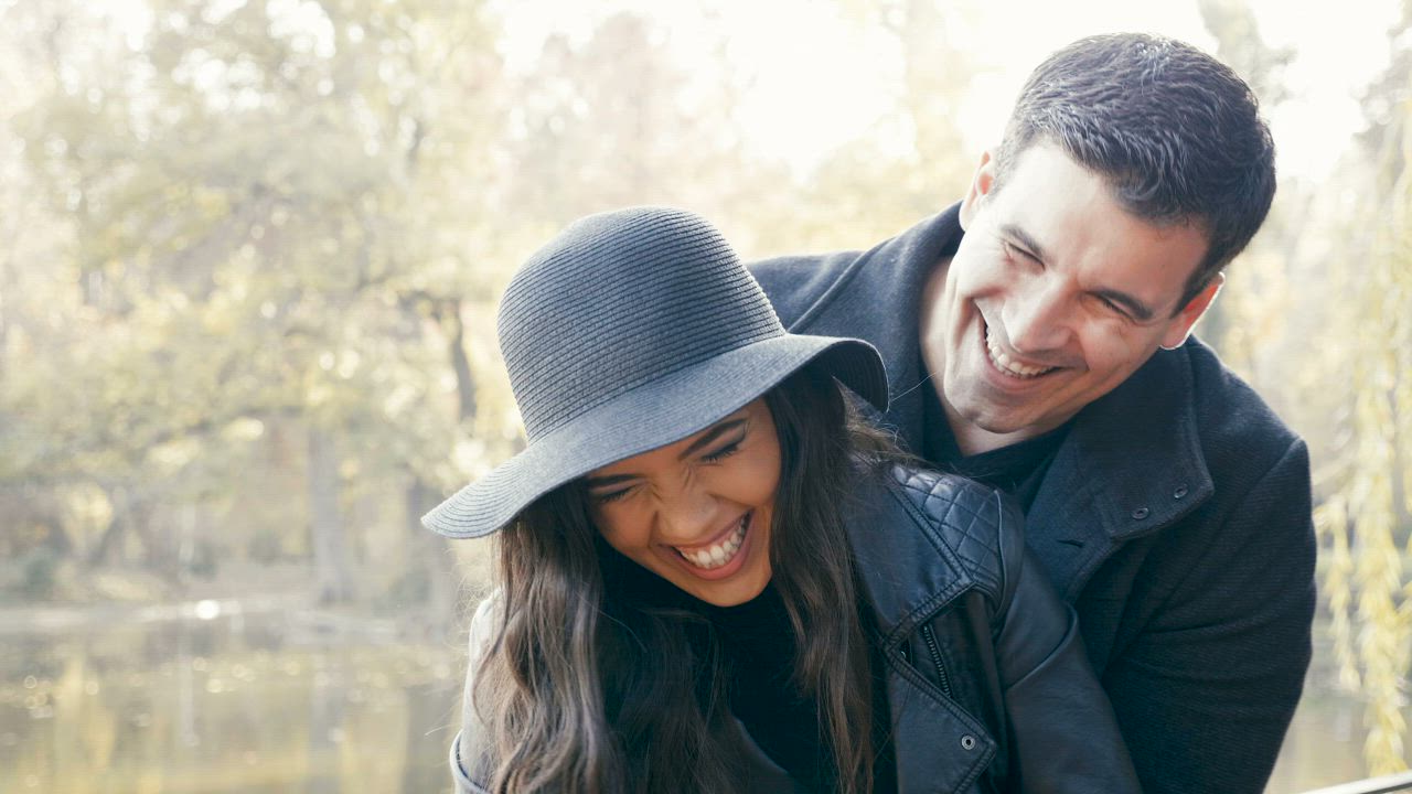 Happy couple hugging in the park - Free Stock Video