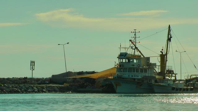 Fishing boat anchored on the coast.