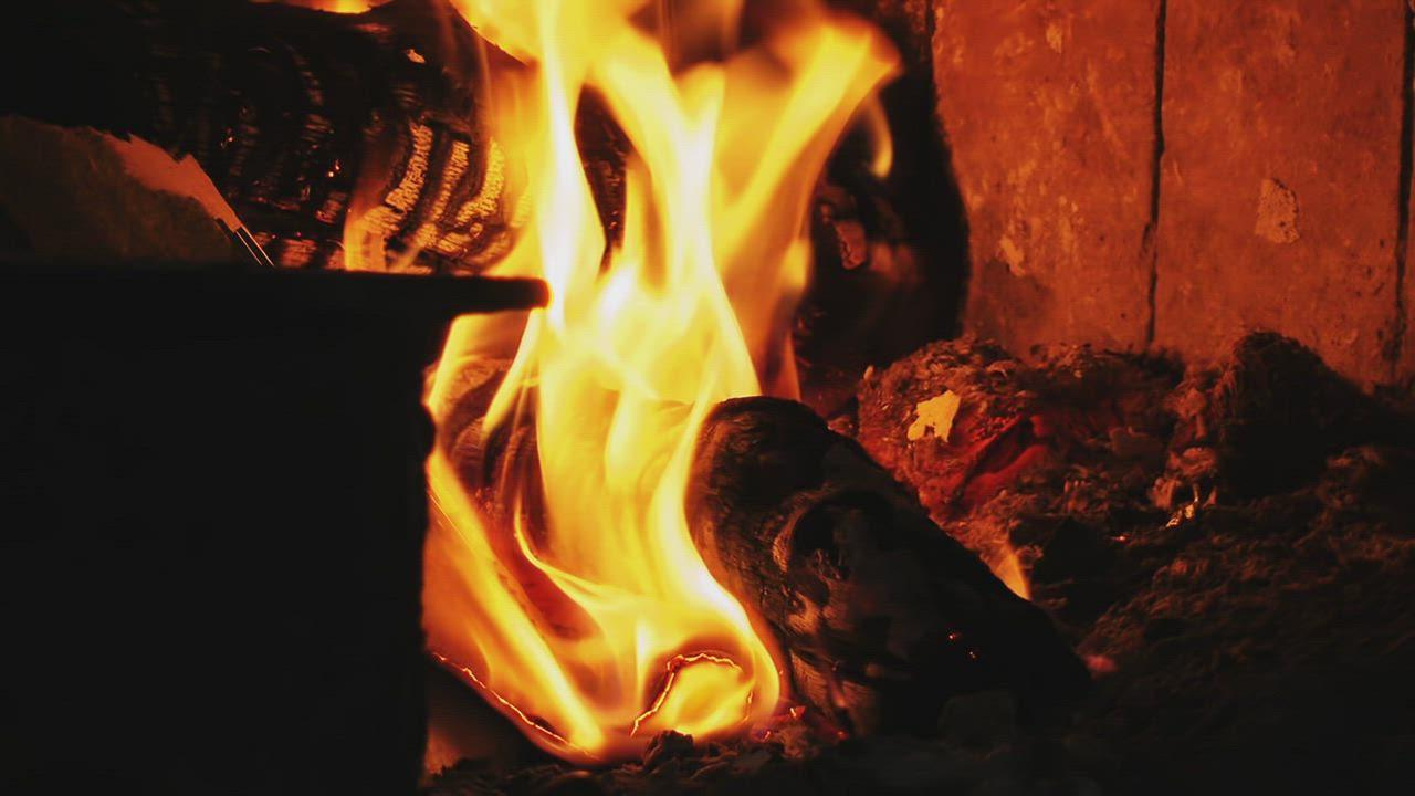 Firewood burning in the fireplace - Free Stock Video