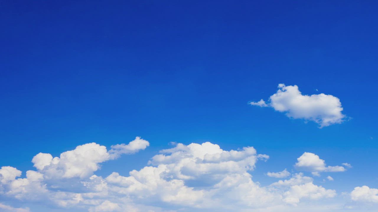 Blue sky with clouds moving and disappearing - Free Stock Video