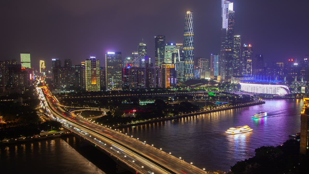 Highway with fast motion traffic and the cityscape - Free Stock Video