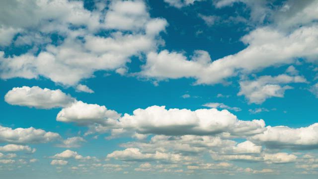 Clouds moving along the sky.