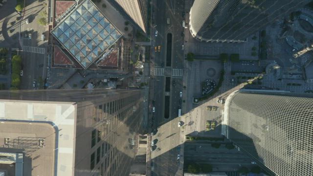 Down shot among buildings.