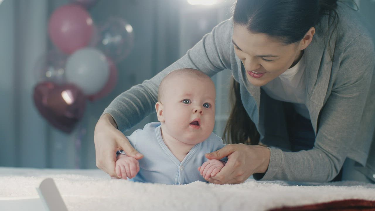 Happy Mother Kisses Her Little Baby Free Stock Video