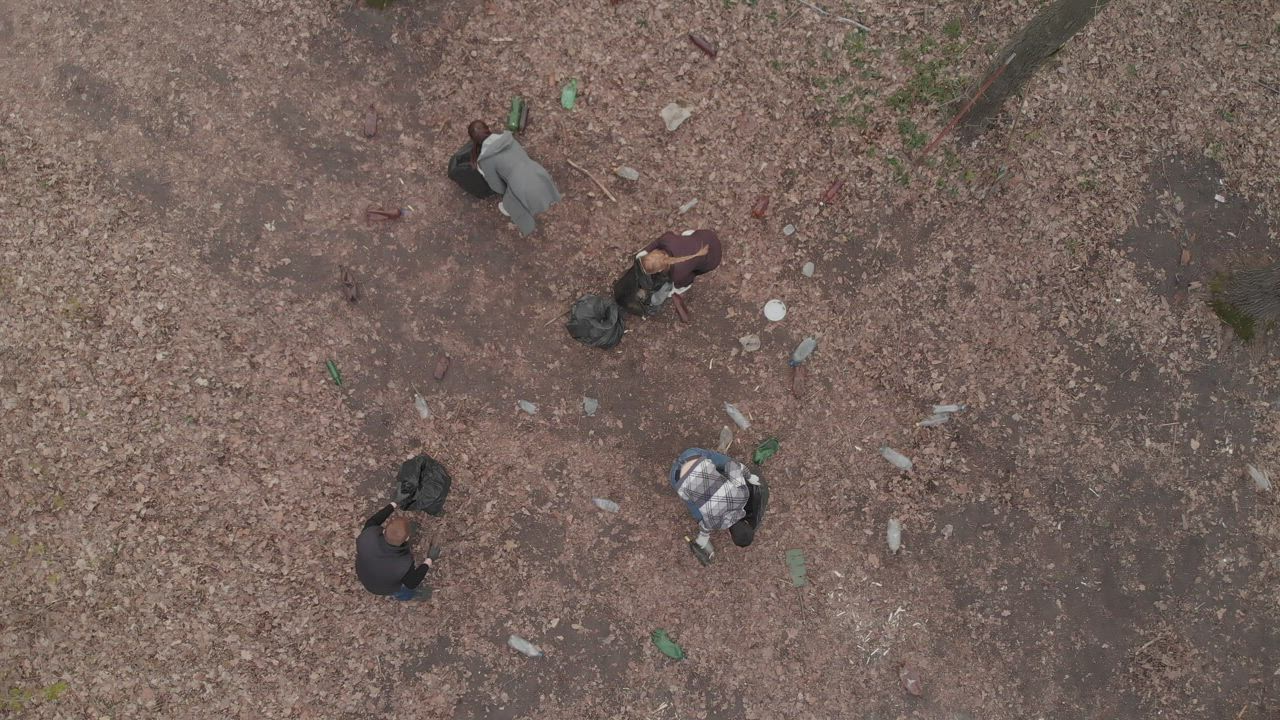 Volunteers picking up trash in nature - Free Stock Video