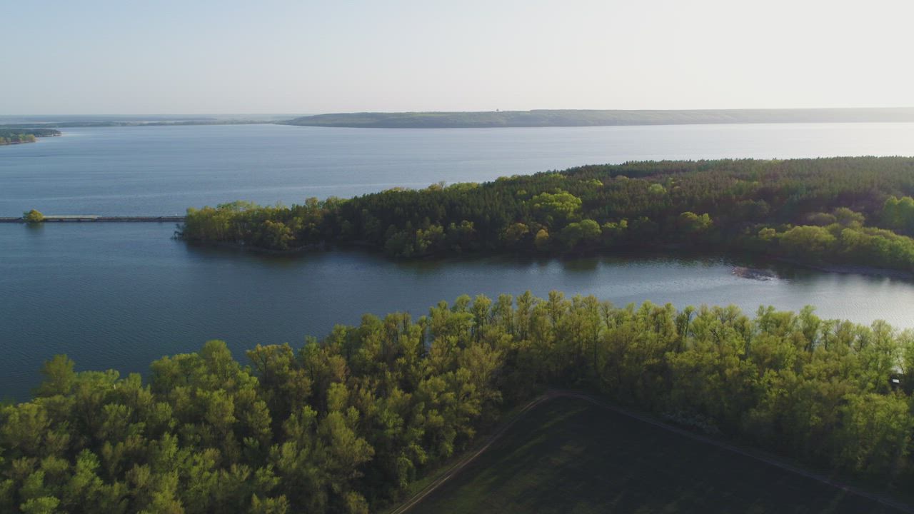 Aerial view of a huge river in spring - Free Stock Video