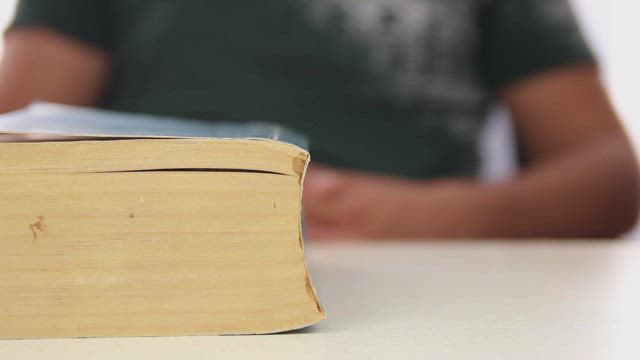 Man does not read a book.