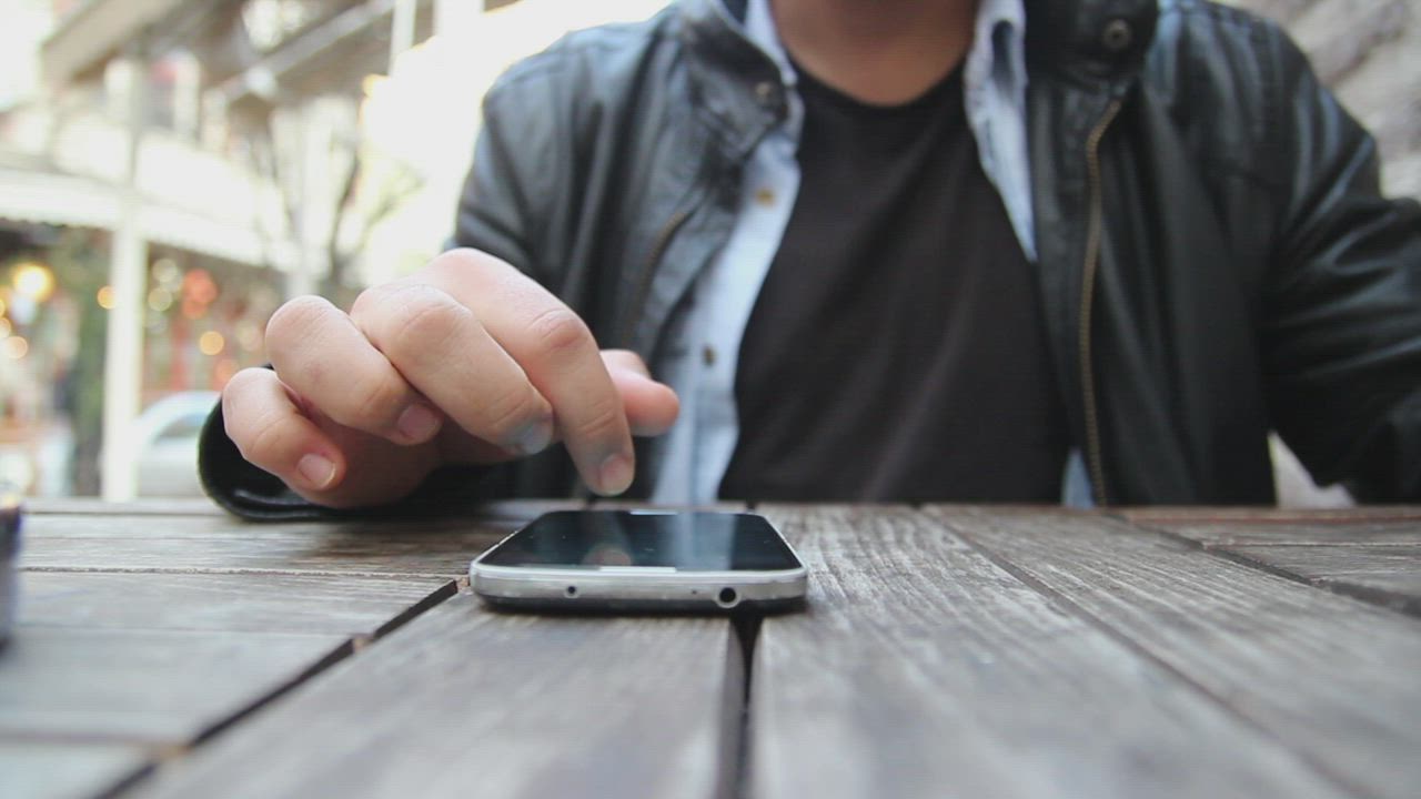 Phone left on a café table