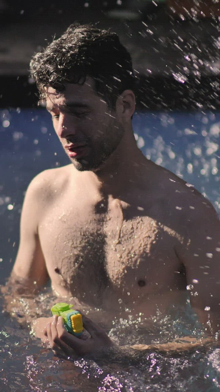 Man having fun in a swimming pool - Free Stock Video