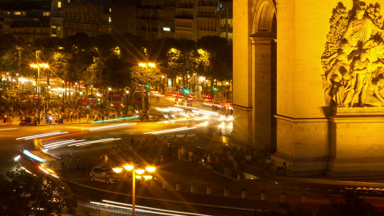 Night roundabout with fast-motion traffic - Free Stock Video