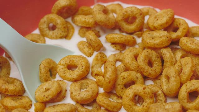 Bowl with cereal and milk, rotating slowly.