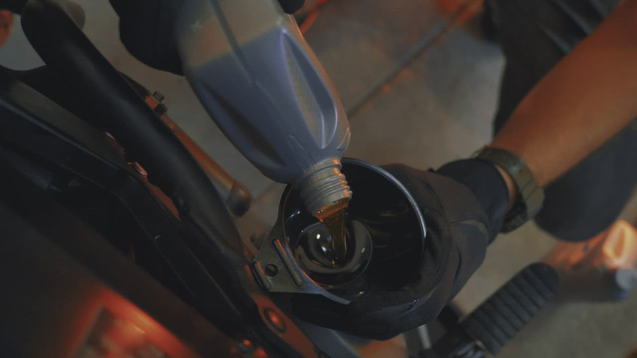 Mechanic working inside an auto repair shop