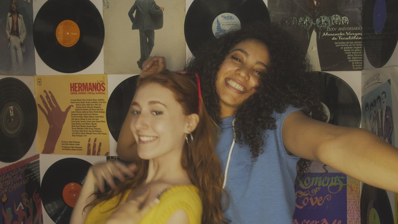 Girls recording and dancing with a cell phone - Free Stock Video