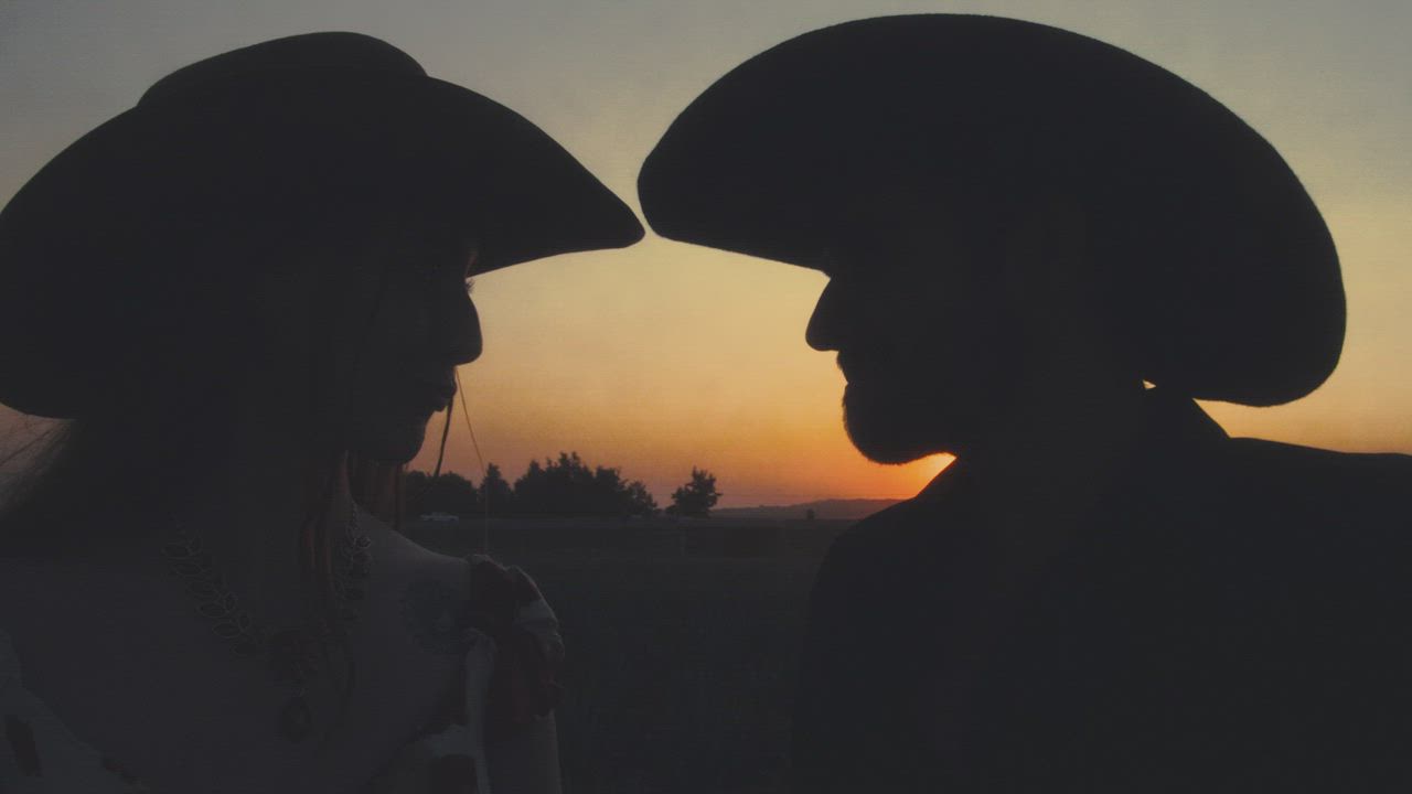 Romantic scene of a couple at sunset on a ranch - Free Stock Video