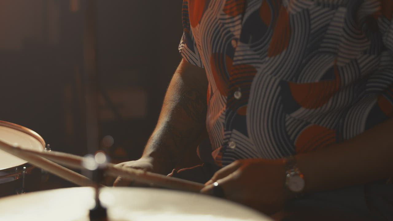 Close shot of a drummer jaming in a studio - Free Stock Video