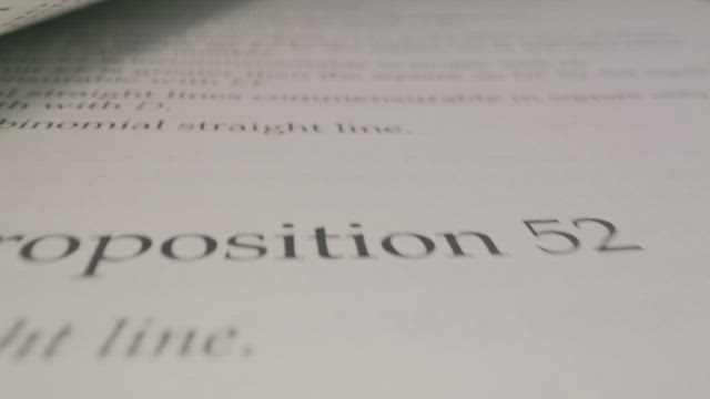 Close shot of a book while turning the page.