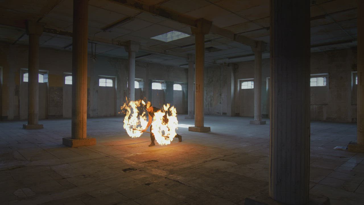 Skillful acrobat doing tricks with fire - Free Stock Video