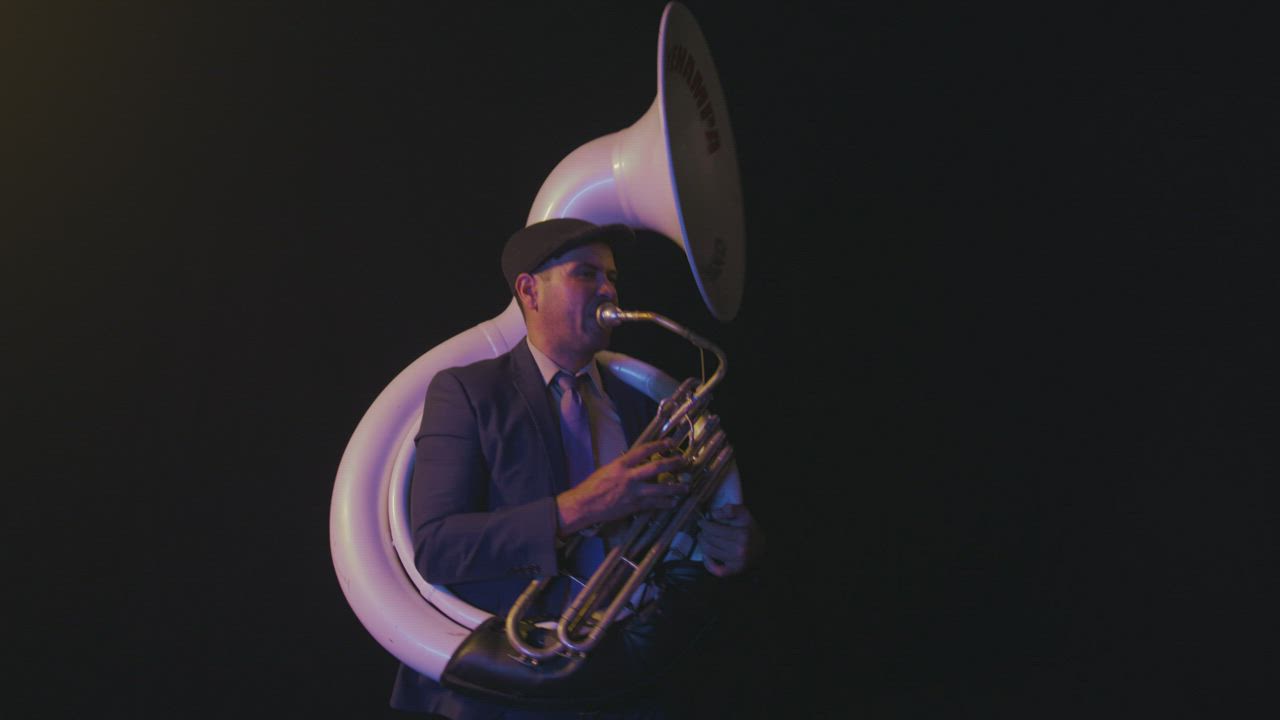 Trumpeter playing the trombone dancing - Free Stock Video