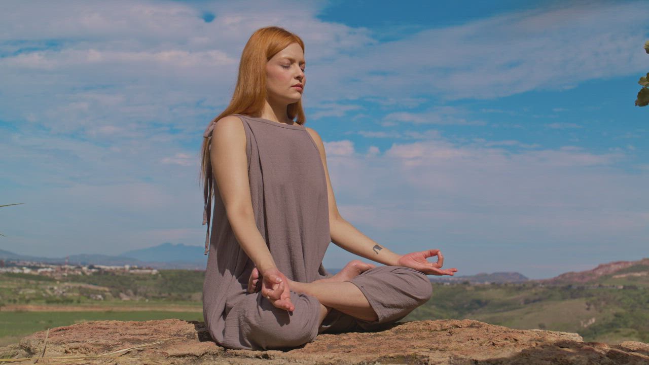 Woman meditating in nature