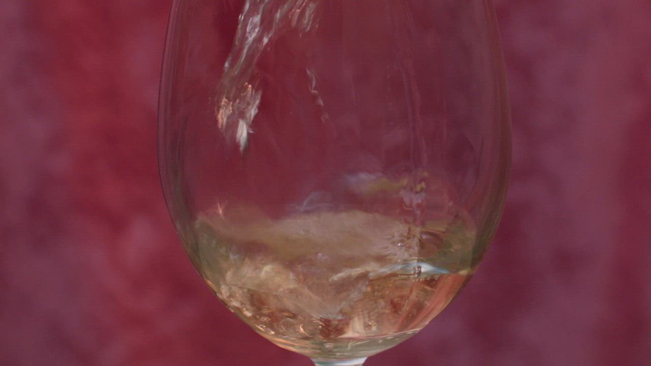 How to properly serve white wine in a glass Free Stock Video