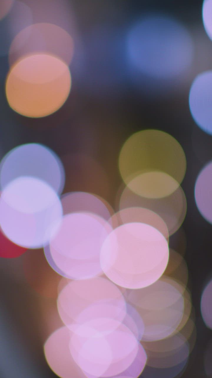 Texture of many colored lights in a defocused shot - Free Stock Video