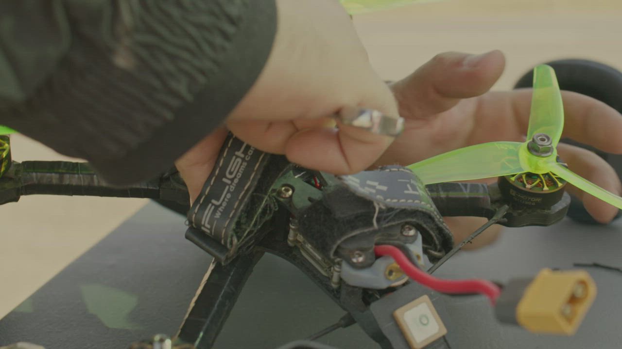 Hands of a man putting the propellers on a drone - Free Stock Video