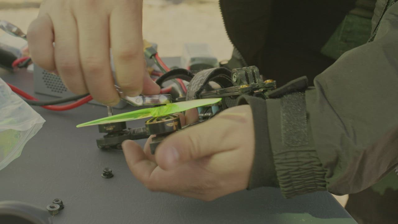 Man assembling the propellers to a drone - Free Stock Video