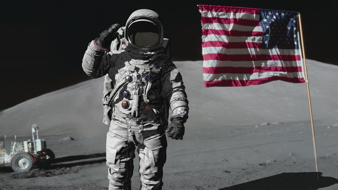Astronaut saluting on the Moon next to the Star-Spangled banner - Free ...