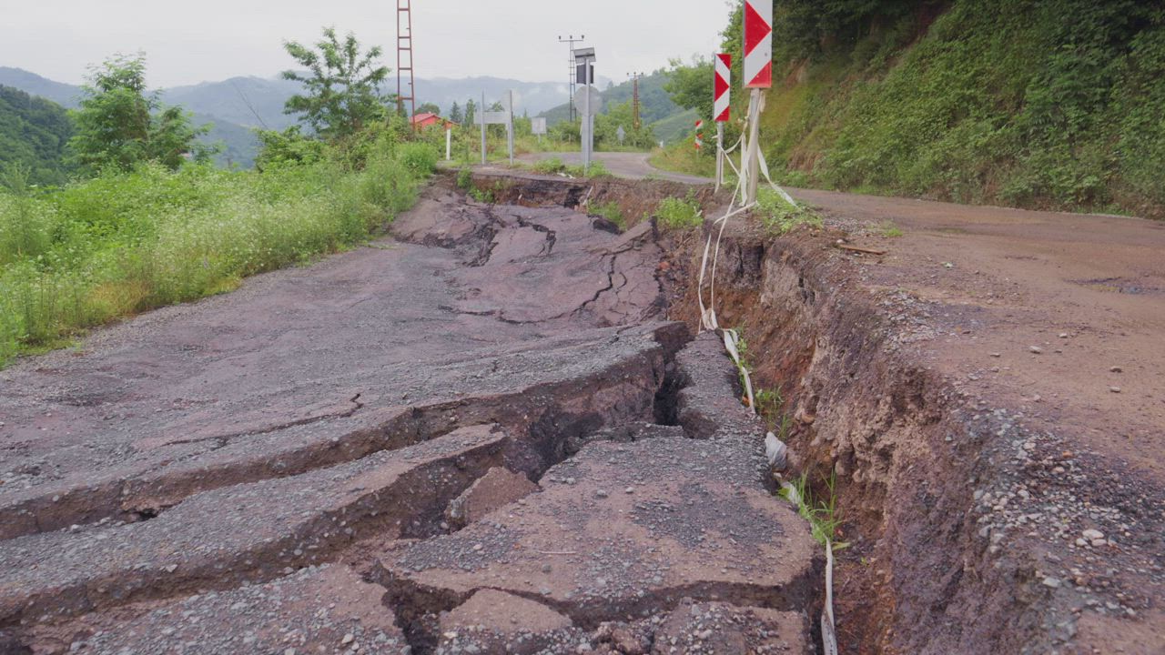 Cracked and destroyed pavement - Free Stock Video