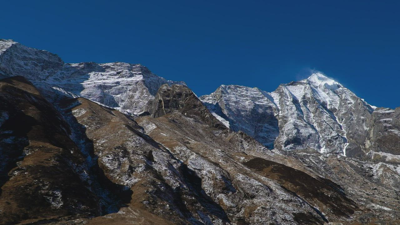 A panning shot of the Himalayas mountain range - Free Stock Video