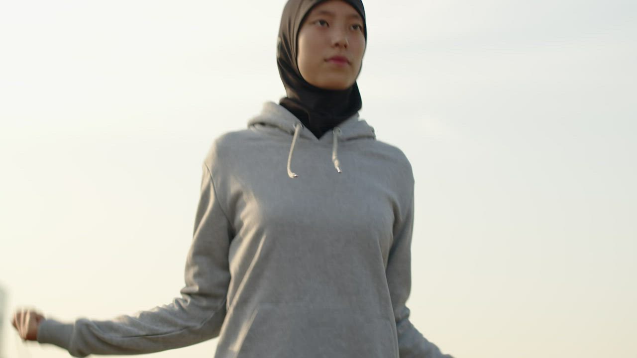 Person using a jumping rope for cardio in the early morning - Free ...