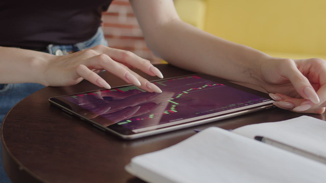 Investor reviewing mortgage options on tablet