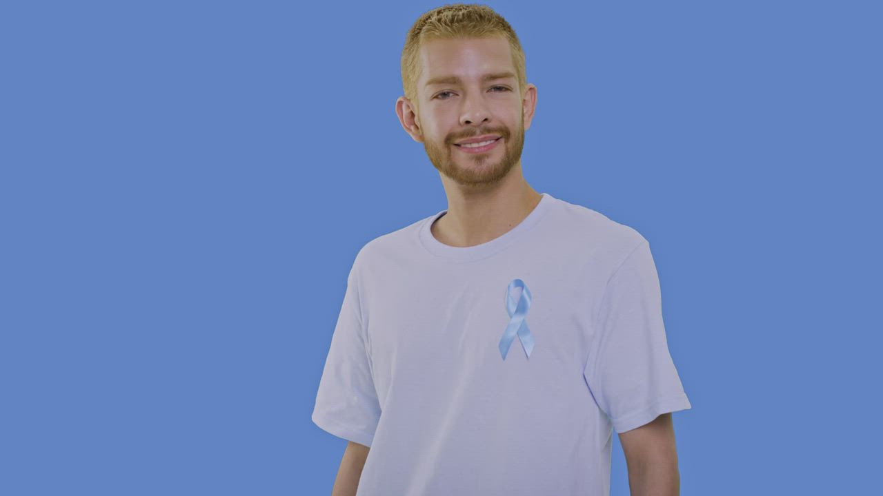 Man with a ribbon in support of prostate cancer - Free Stock Video