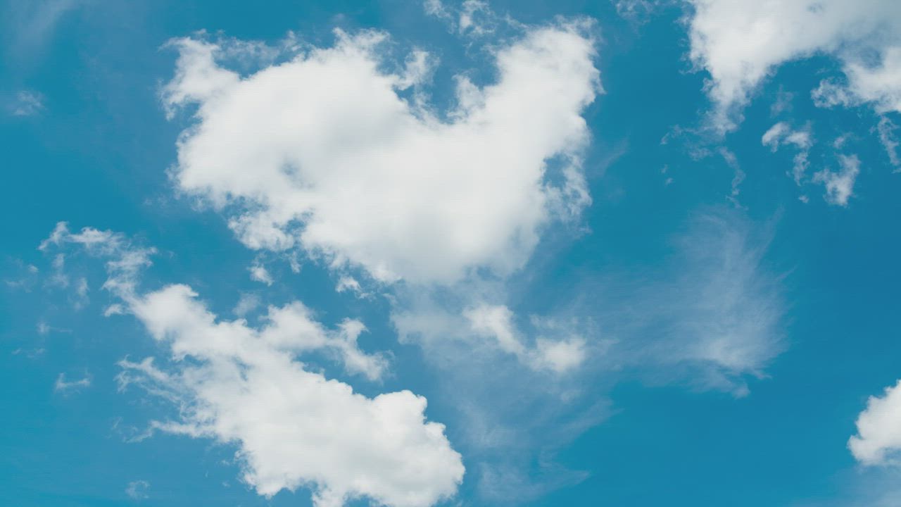 Time lapse of a sunny day with clouds - Free Stock Video