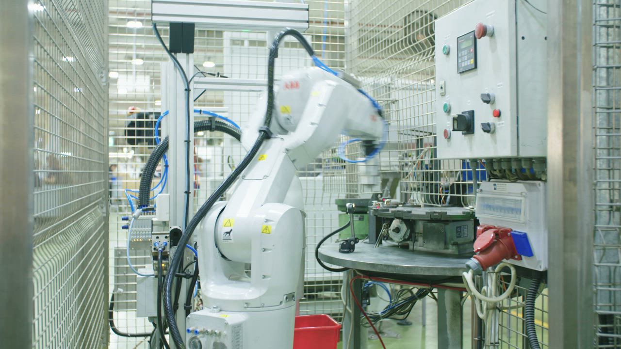 A robot working on a factory production line
