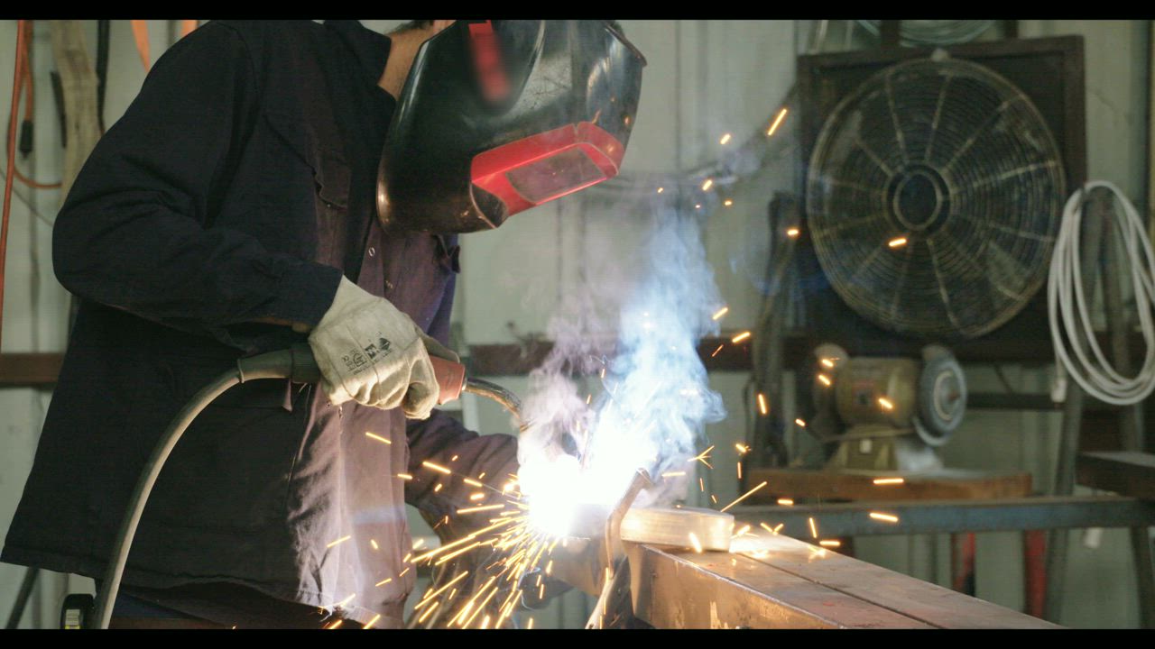 Apprentice welder in training on a trades and technical skills programme